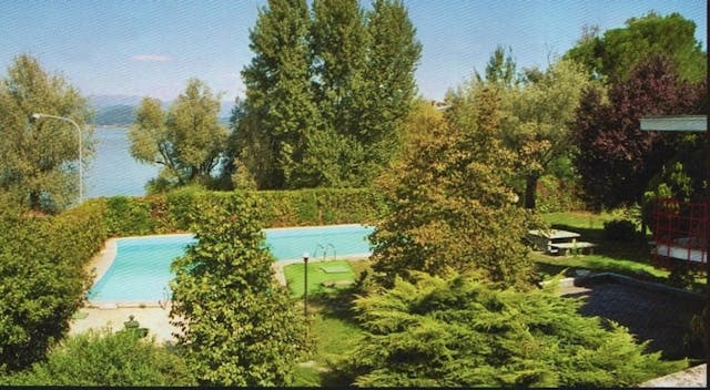 Lago Maggiore lakefront villa with large garden and pool, 20m from shore